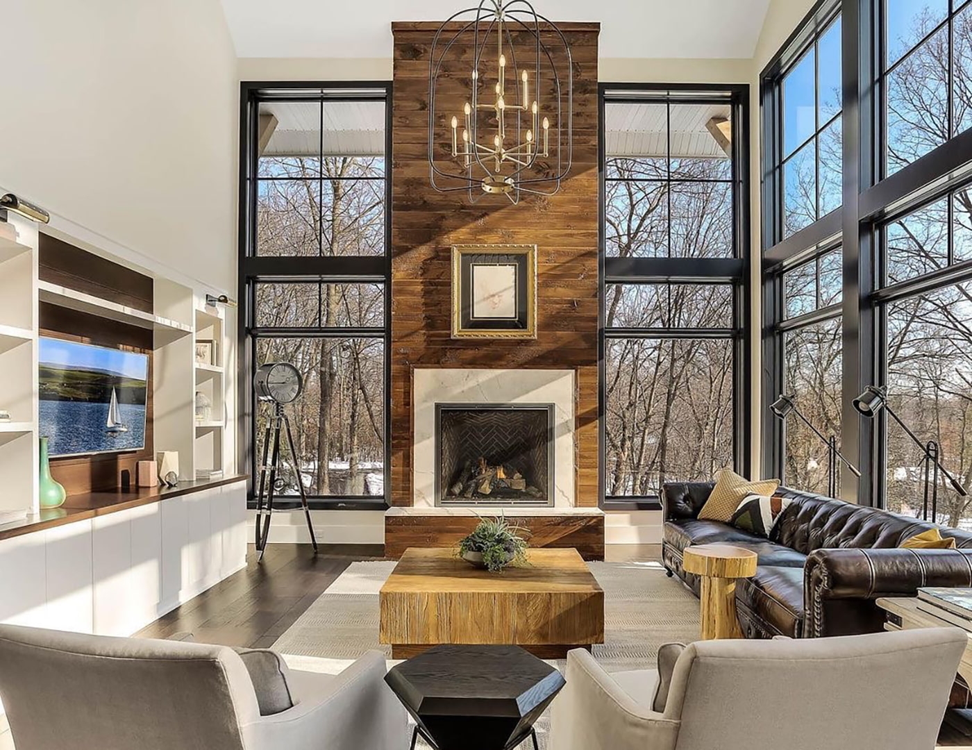 Living Room Wood Plank Fireplace Black Picture Windows