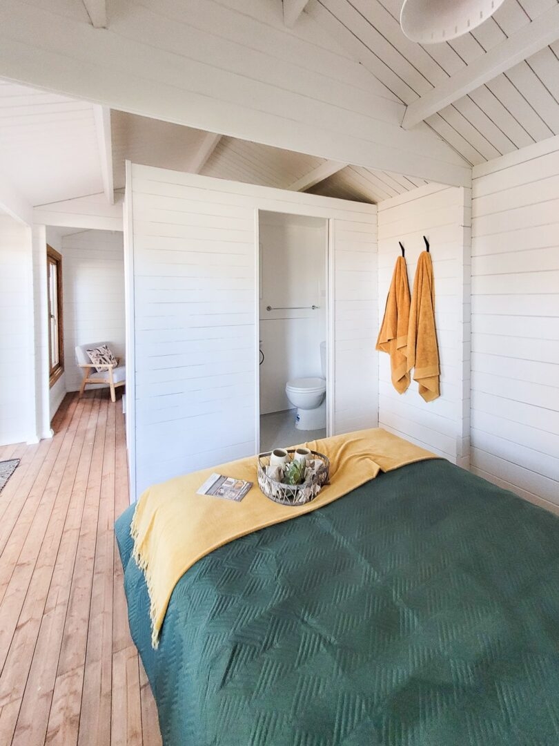 Log Cabin Interior with Ensuite Partition and White Shiplap