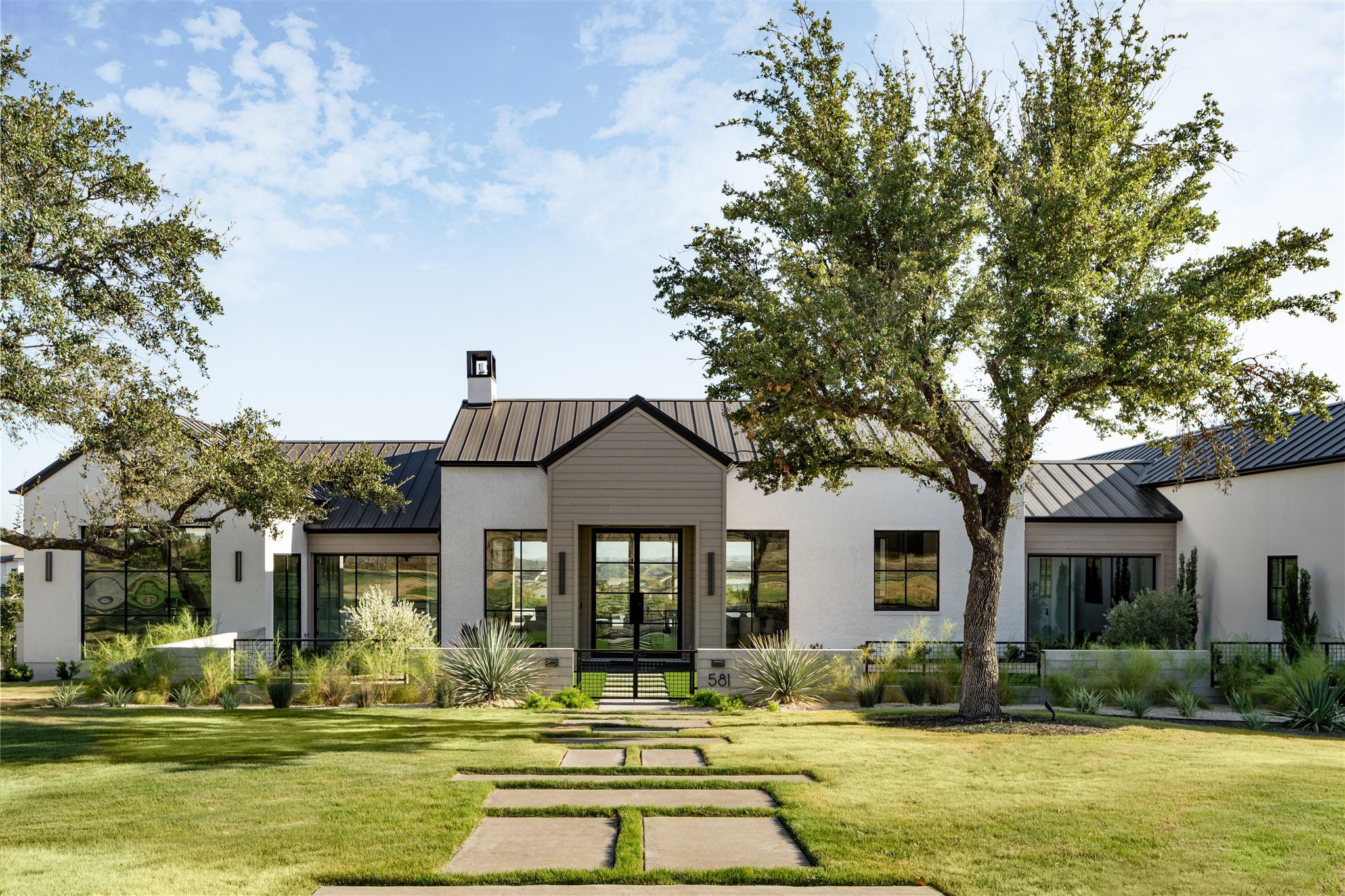 Modern Farmhouse Paver Walkway: Scandinavian Farmhouse Exterior.