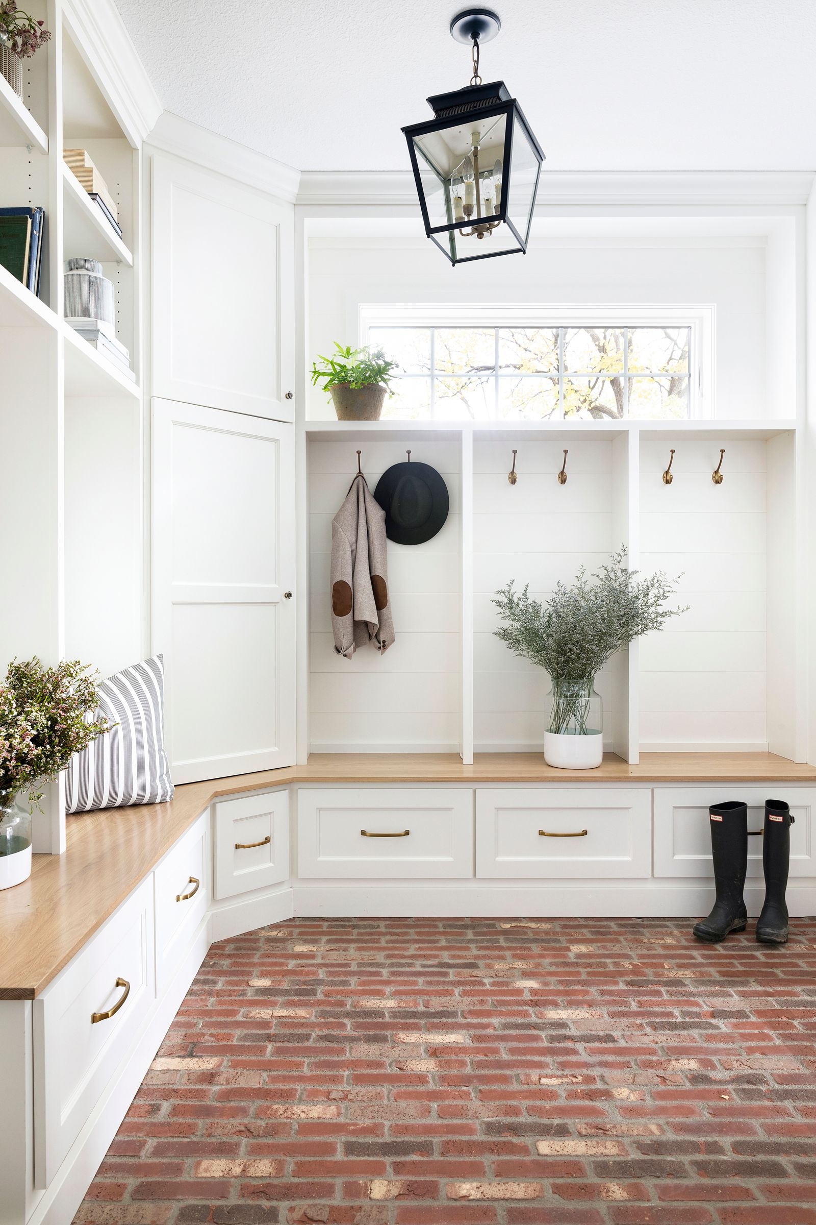 Mudroom Bench: L-Shaped Bench with Red Brick Floor Entry