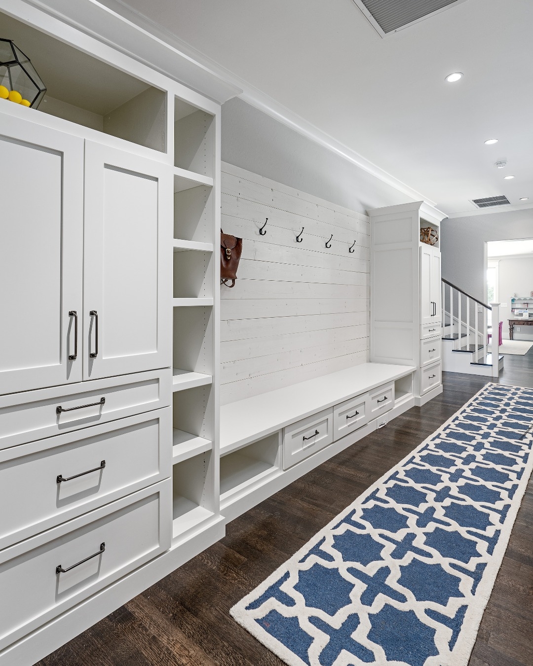 Mudroom Built In With Navy Geometric Rug and Shiplap