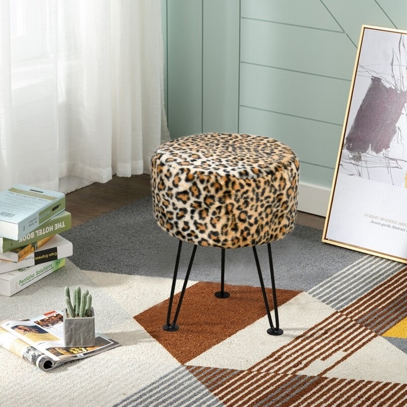 Ottoman with Thin Metal Legs and Faux Fur Accent Seating