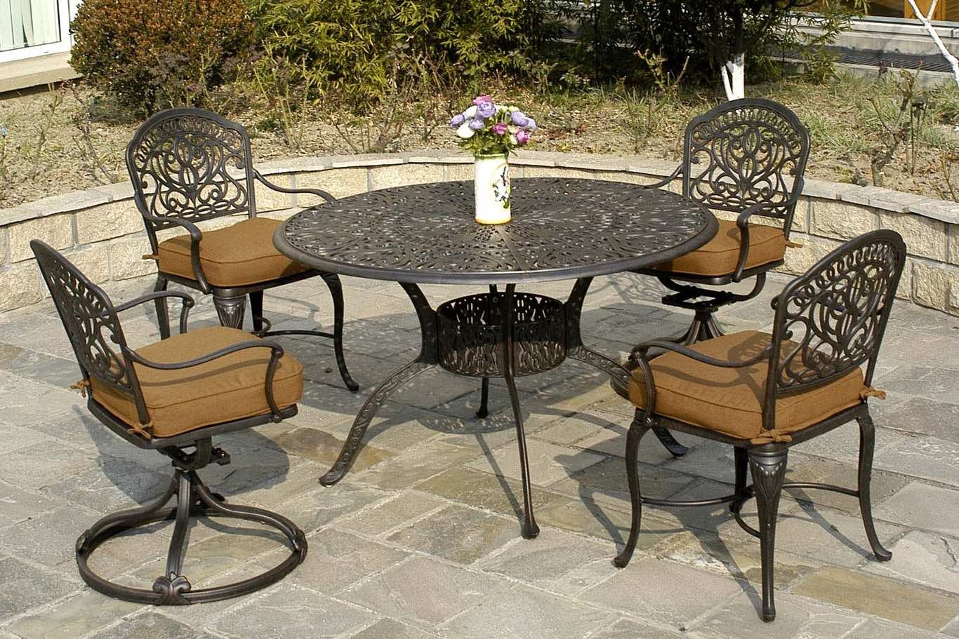 Outdoor Dining Set featuring Scrollwork Tabletop and Swivel