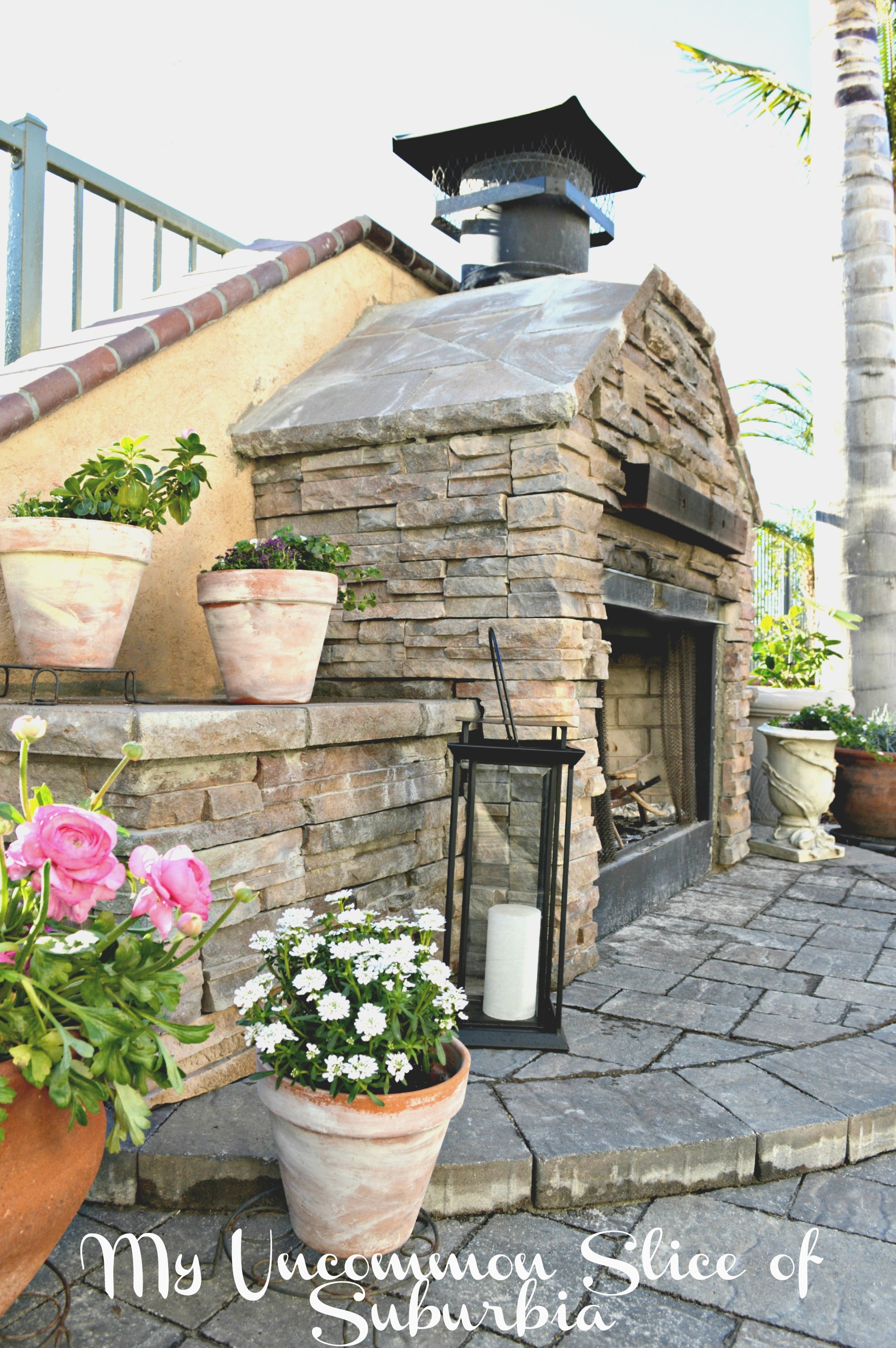 Outdoor Fireplace Gabled Silhouette and Built-in Stone Ledge