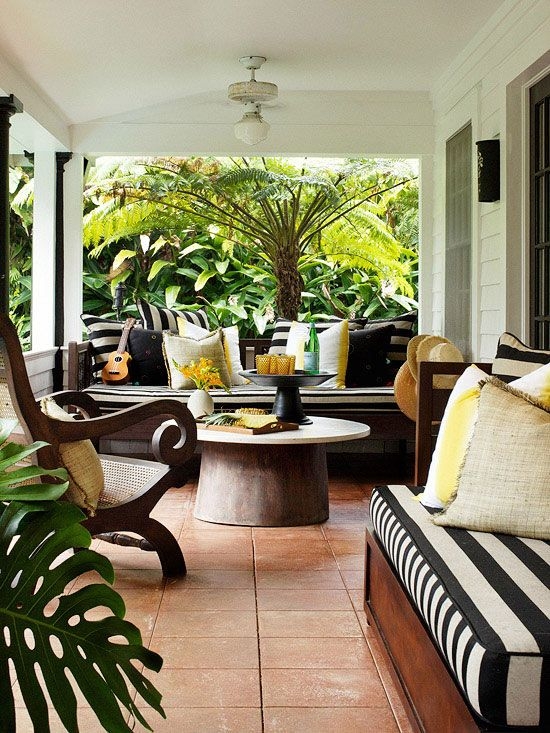 Outdoor Living Set with Yellow Accent Pillows and Terracotta Tile