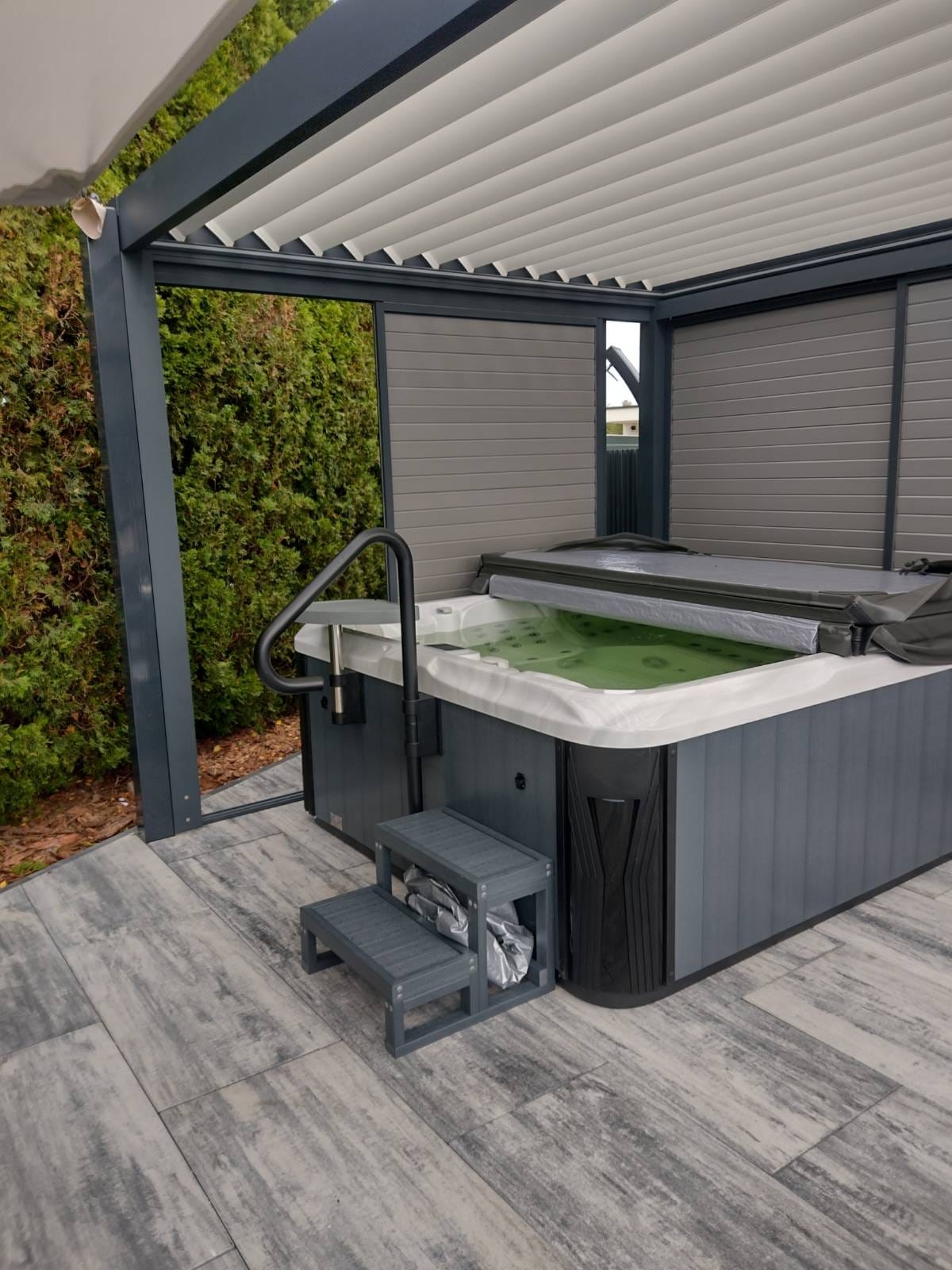 Outdoor Spa Pergola Design with Horizontal Privacy Panels
