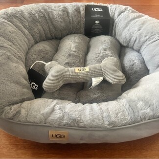 Pet Bed: Bolstered Rim Faux Fur Cuddler With Bone Toy