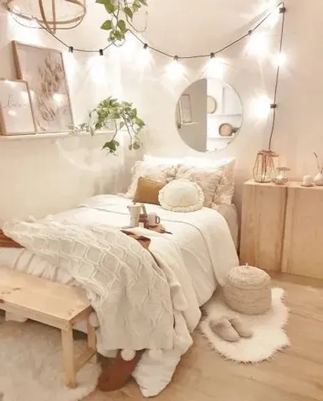 Platform Bed with Globe String Lights and Cozy Boho Bedroom Decor