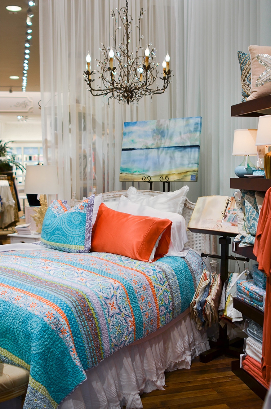 Quilted Bed: Coral and Teal Palette with Ruffled Skirt