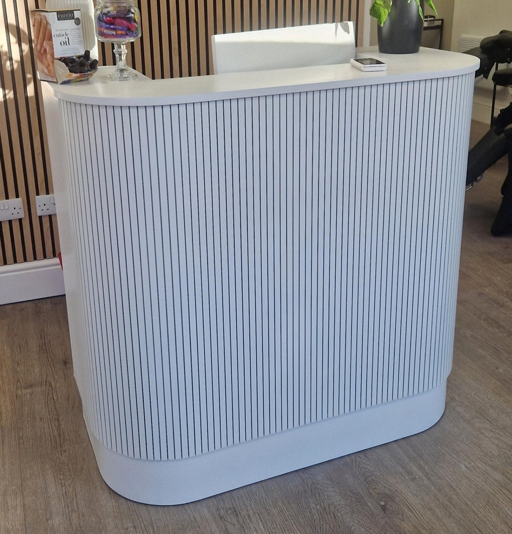 Reception Desk with Fluted Paneling and Curved U-Shape