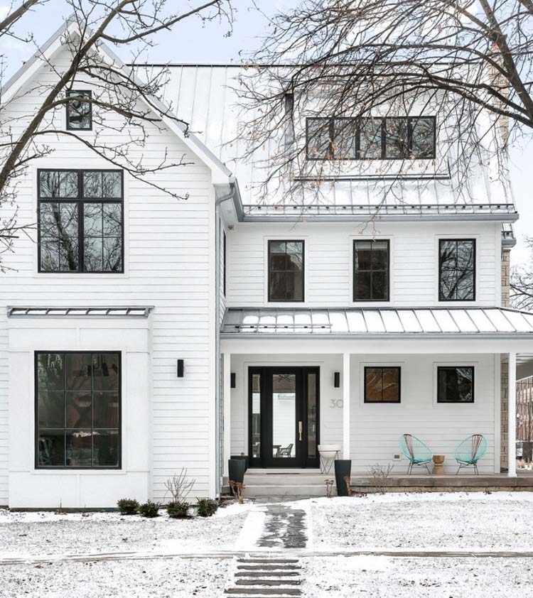 Residential Building Black Window Frames: Scandinavian Farmhouse Exterior.