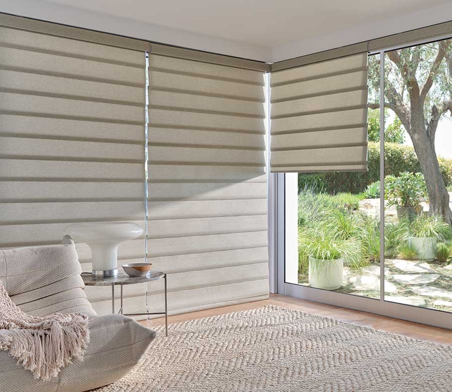 Roman Shades with Cascading Folds and Neutral Sunroom Decor