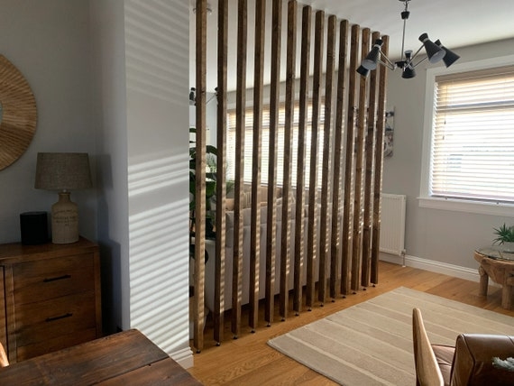 Room Divider: Rhythmic Spaced Slats with Adjustable Metal Feet