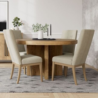 Round Dining Set featuring High Back Chairs and Cross Base