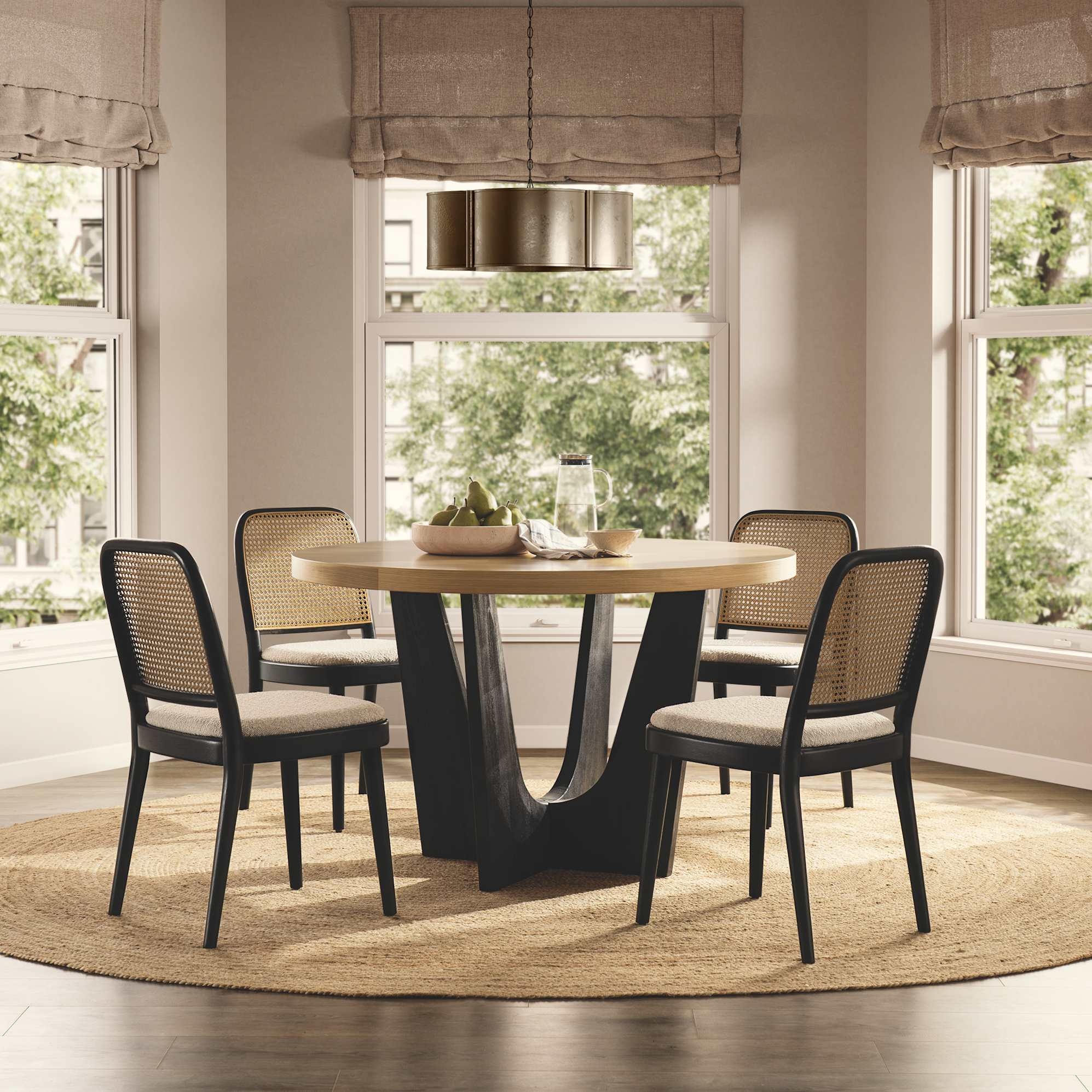 Round Dining Set featuring Sculptural Base and Cane