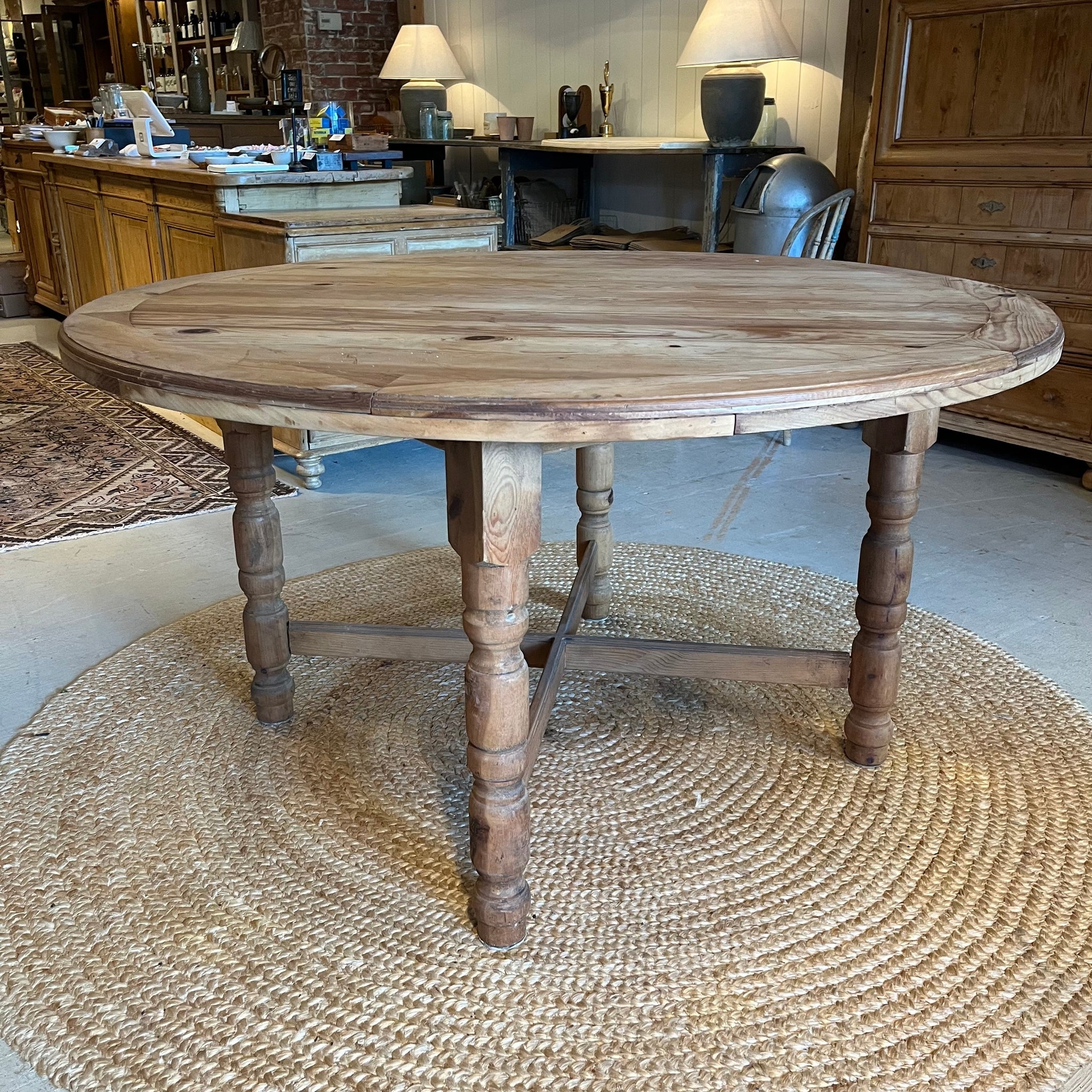 Round Table with X Base Stretcher and Distressed Wood Finish