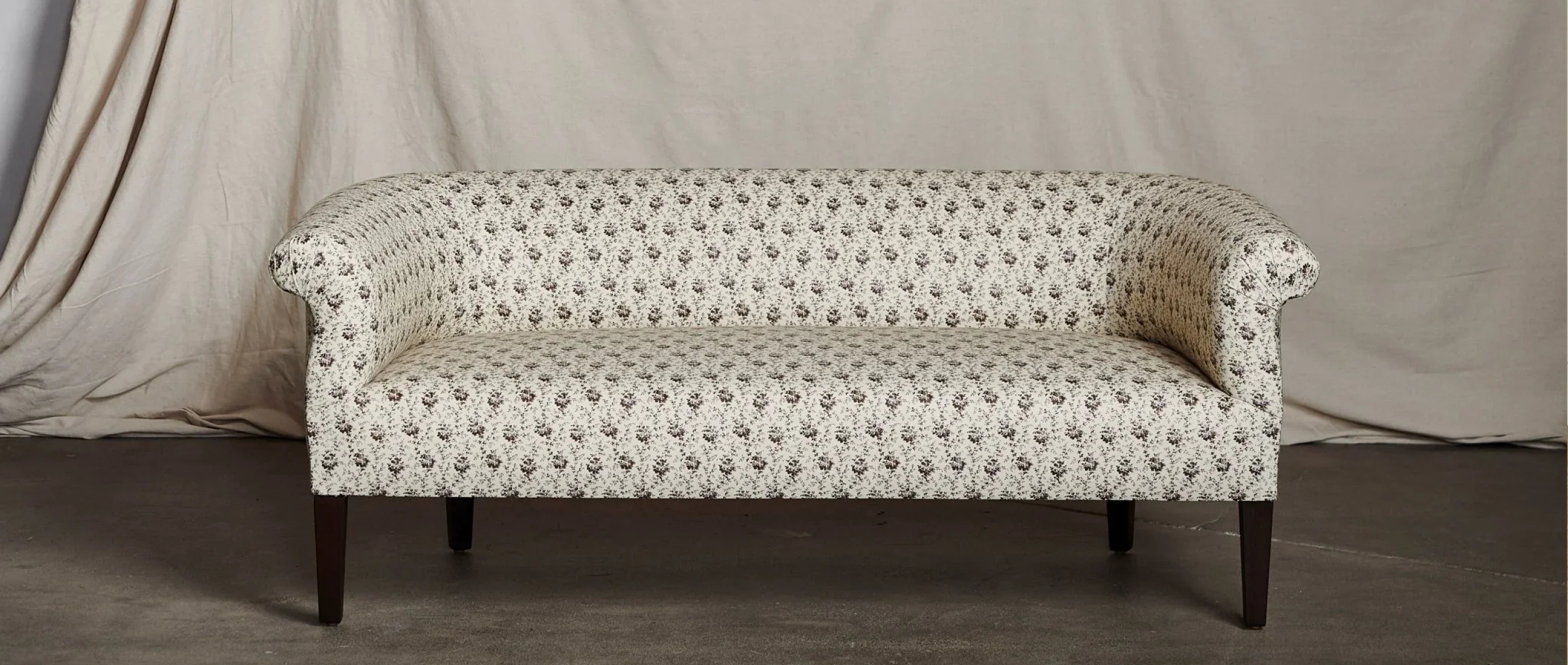 Settee with Botanical Print and Traditional Rolled Arms