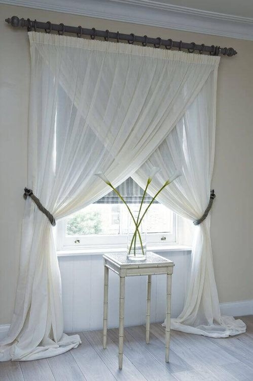 Sheer Curtains with Criss Cross Draping and Rope Tiebacks