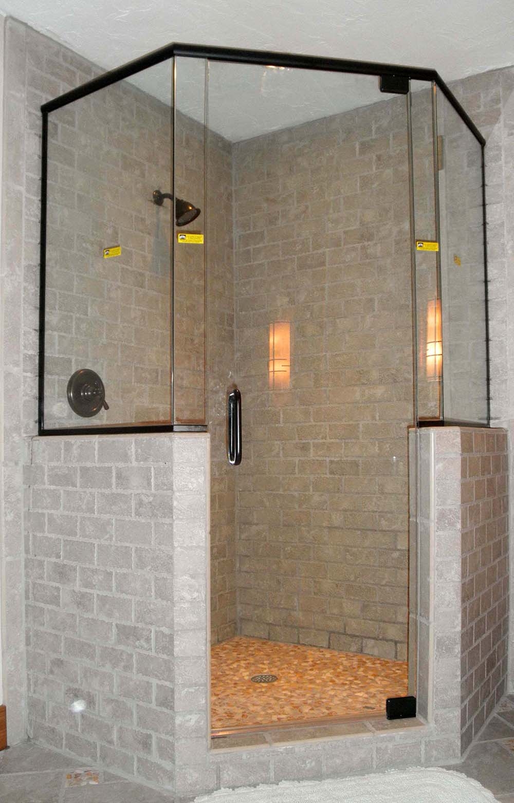 Shower Enclosure black header bar and brick tile design