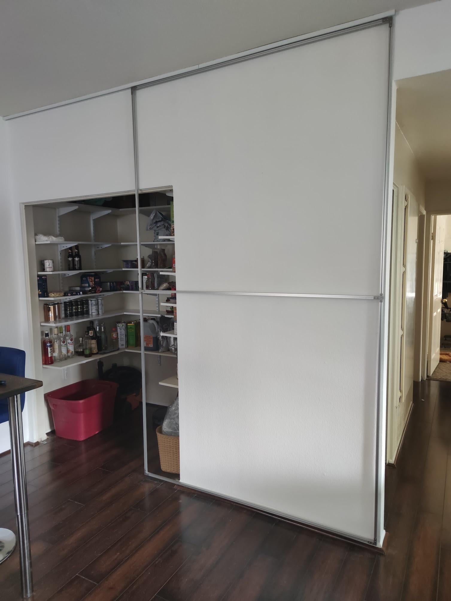 Sliding Wall Slim Profile Concealed Storage Solution
