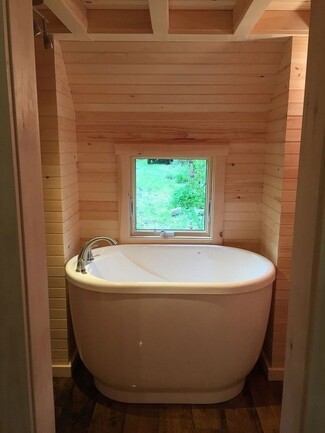 Soaking Bathtub: Deep Profile Rustic Wood Paneled Alcove Bath
