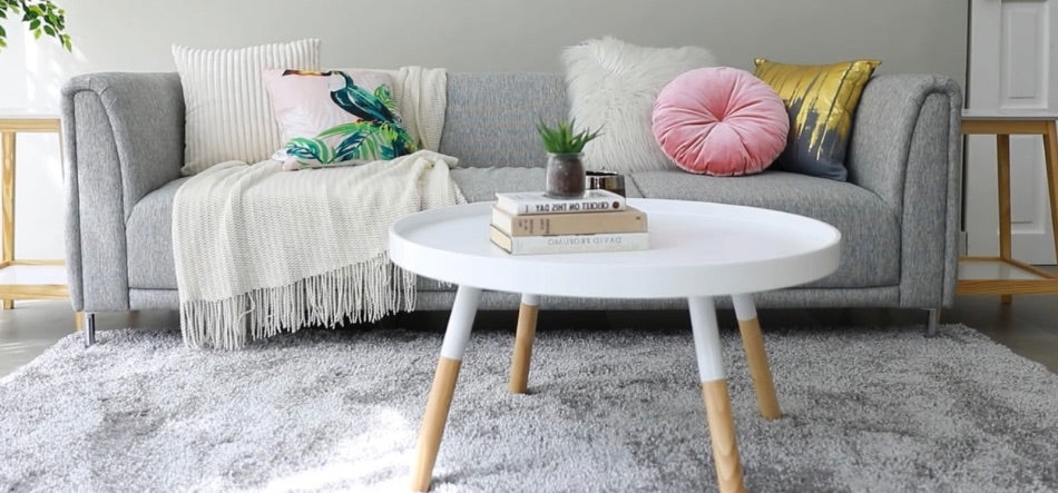 Sofa: Shag Rug Styling and Dipped Wood Table Legs