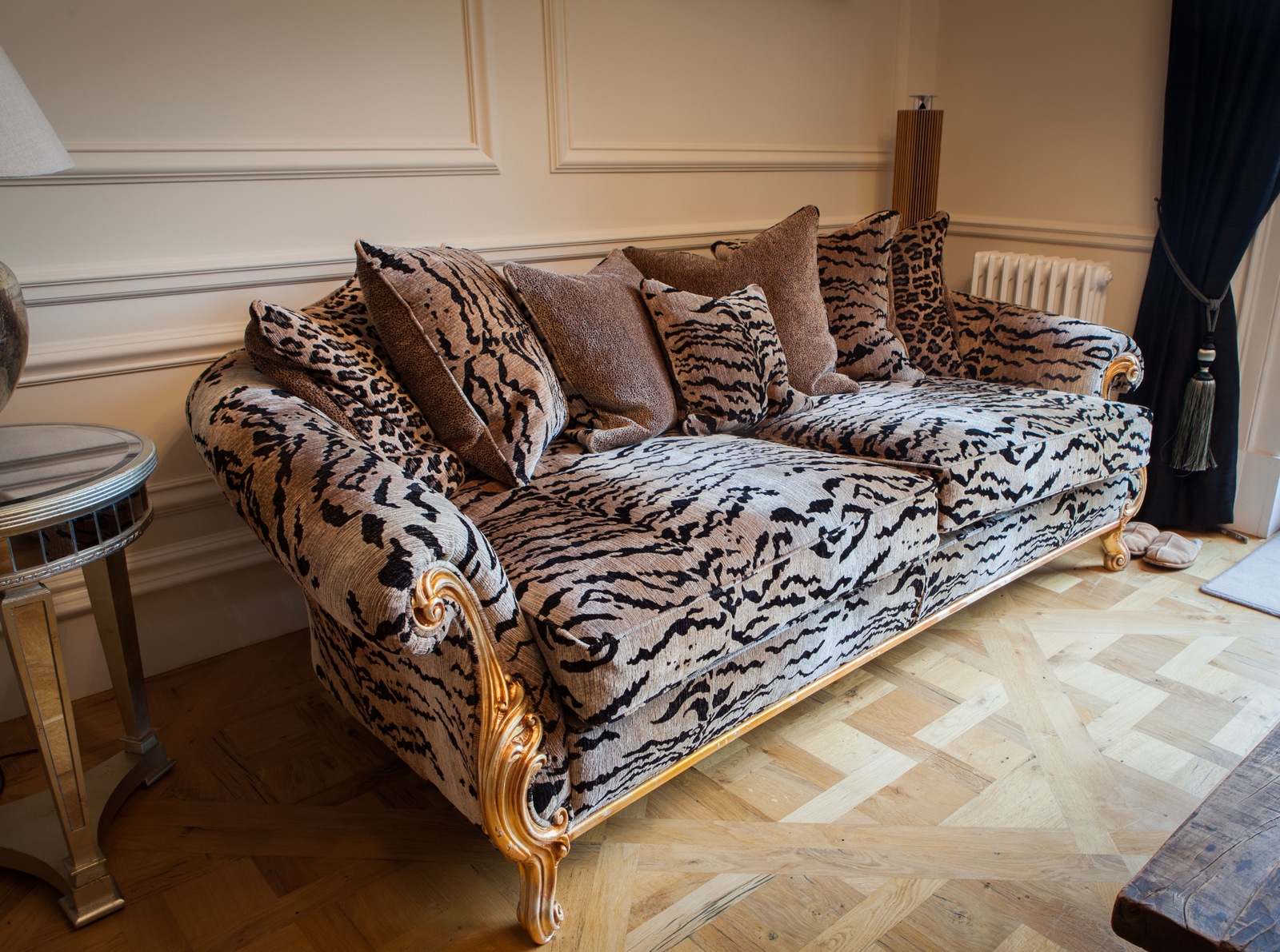 Sofa with Gold Scroll Detailing and Tiger Stripe Luxury Motif