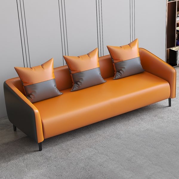 Sofa with Two-Tone Pillows and Slanted Arm Profile