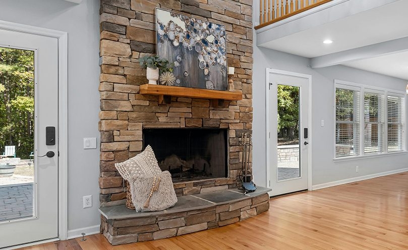 Stacked Stone Fireplace Multi-tonal Stone Honey Wood Mantel
