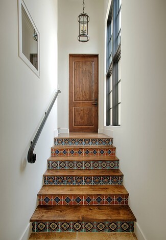 Staircase With Arched Door: Spanish Revival Staircase