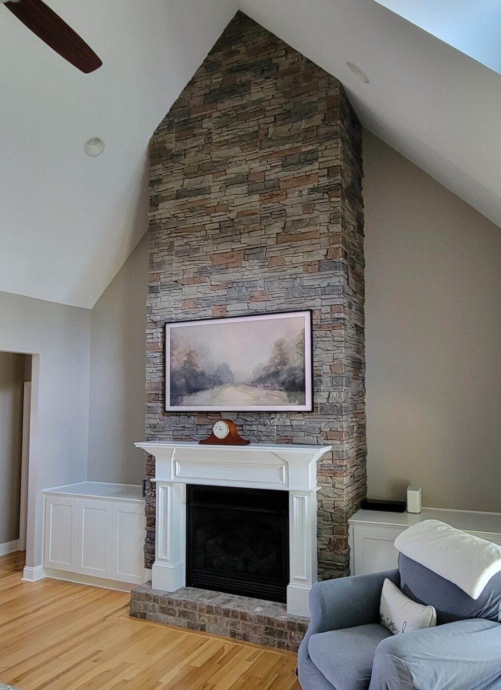 Stone Fireplace Integrated Built-ins and Angled Ceiling Fit