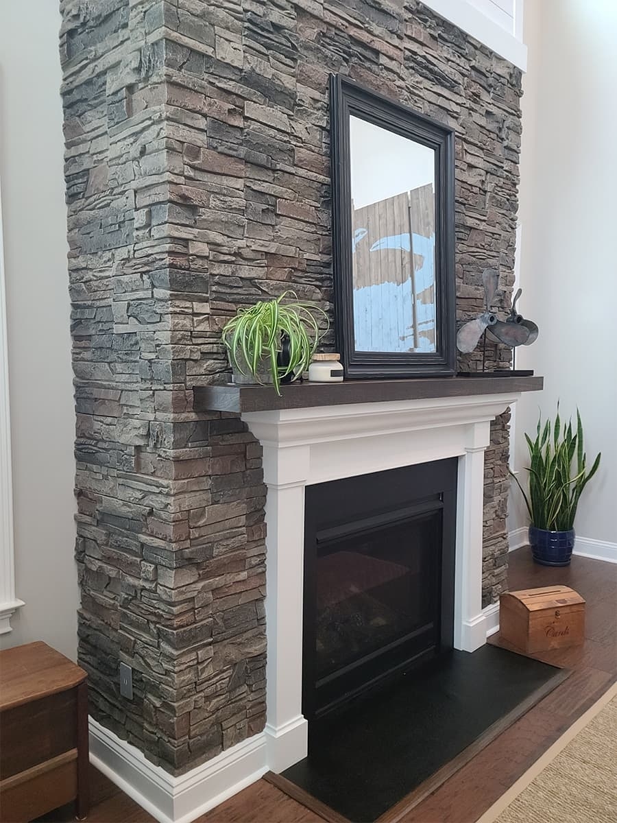 Stone Fireplace White Mantel Surround and Faux Stone Wall