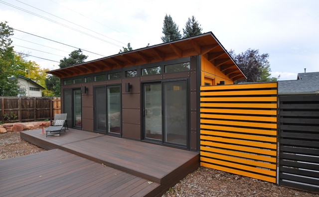 Studio Shed featuring Vibrant Orange Accents and Mono-Pitch Roof