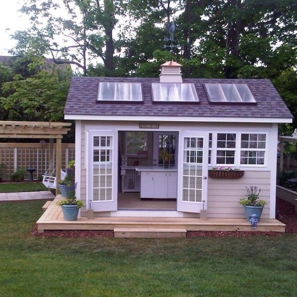 Studio Shed with Skylights and Traditional Wraparound Deck