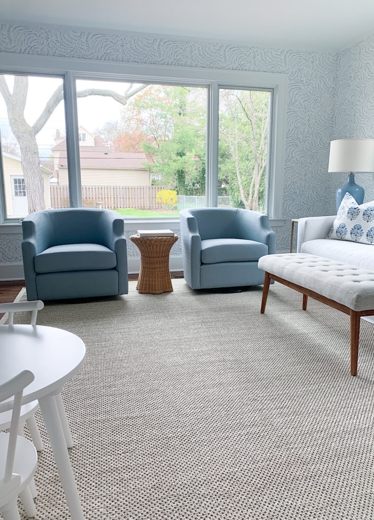 Swivel Accent Chair and Light Blue Rattan Pedestal Table
