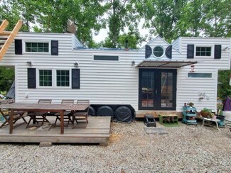 Tiny House: Black Shutters White Tiny House Exterior