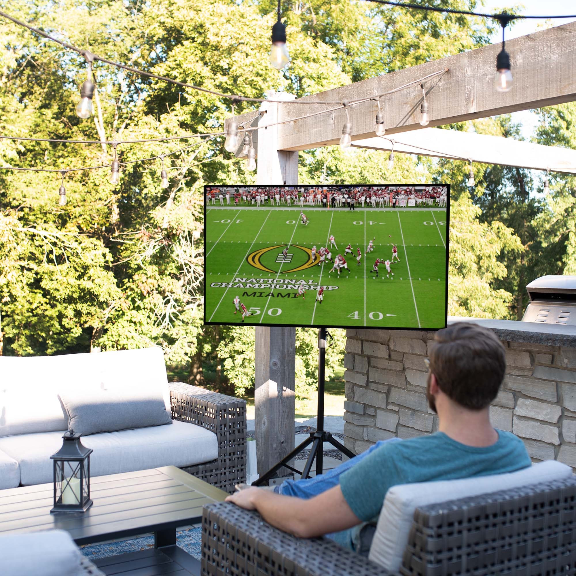 Tripod TV Stand for Portable Mounting in Modern Backyard Theater