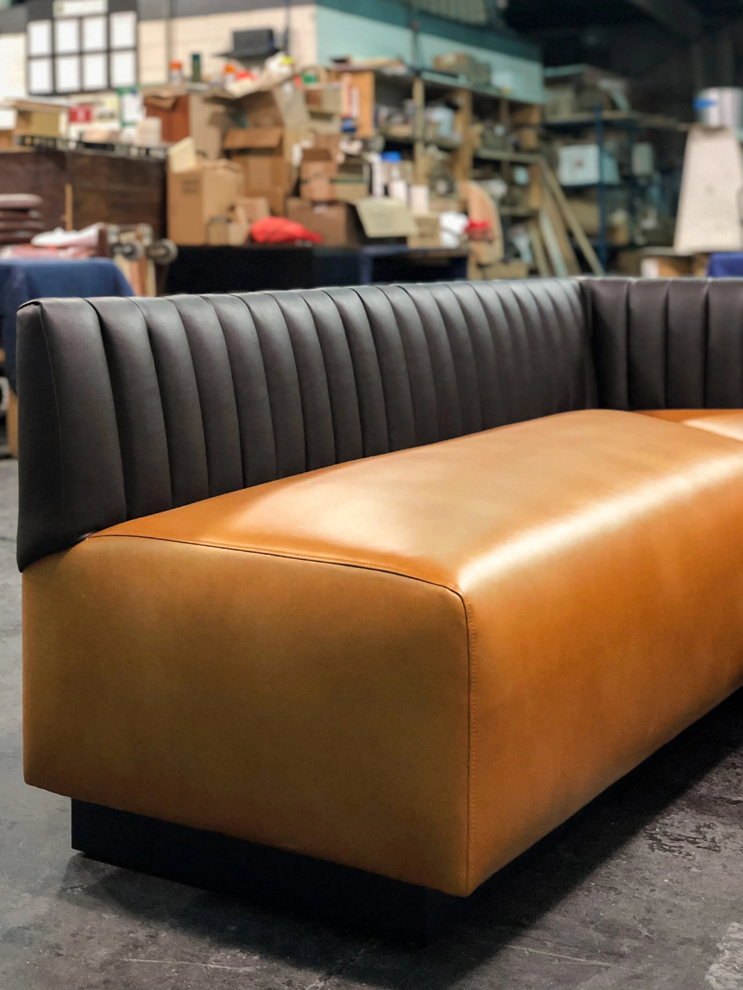 Two-Tone Banquette Seating with Cognac Tan and Charcoal Black Finish