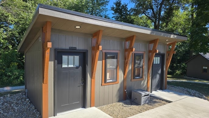 Utility Shed with Oversized Wood Brackets and Dual Entry