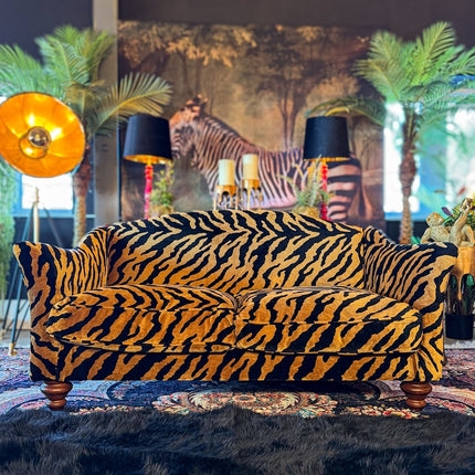 Vintage Sofa featuring Tiger Print and Eclectic Curved Back