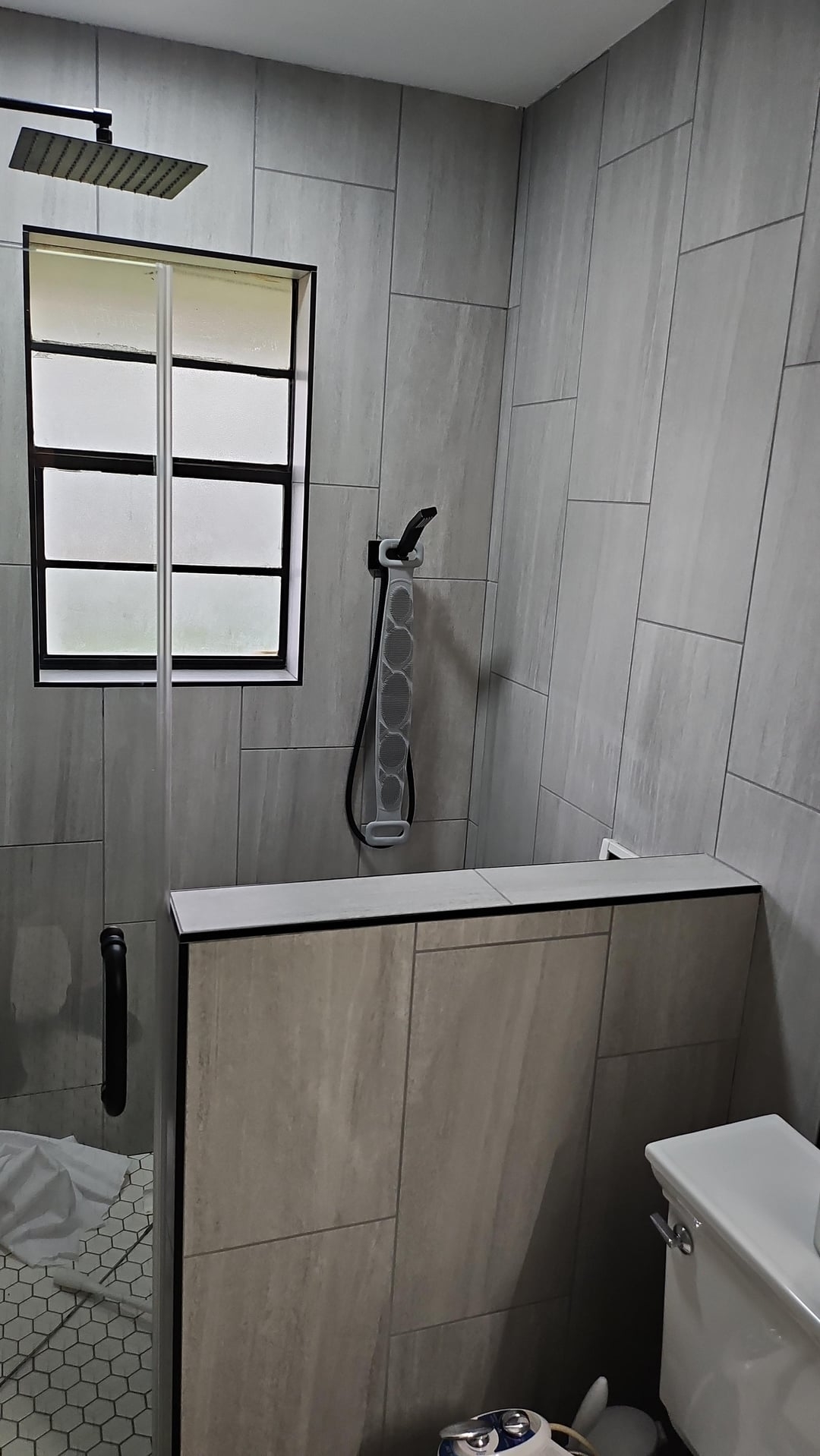 Walk In Shower vertical layout and grey stone tile