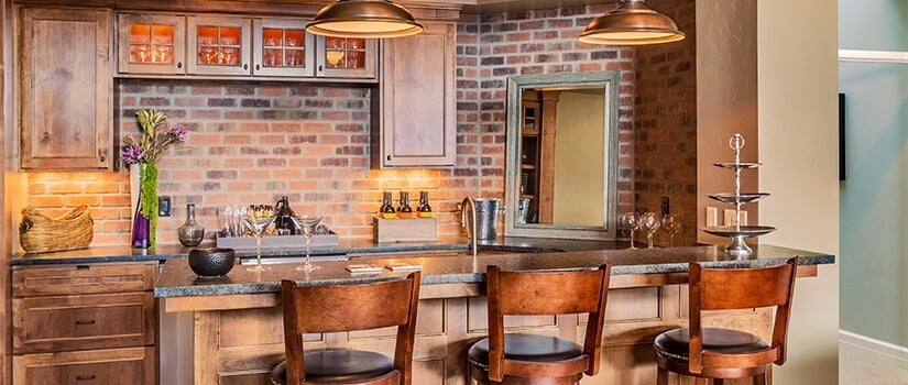Wet Bar with Rustic Brick Backsplash and Wood Seating