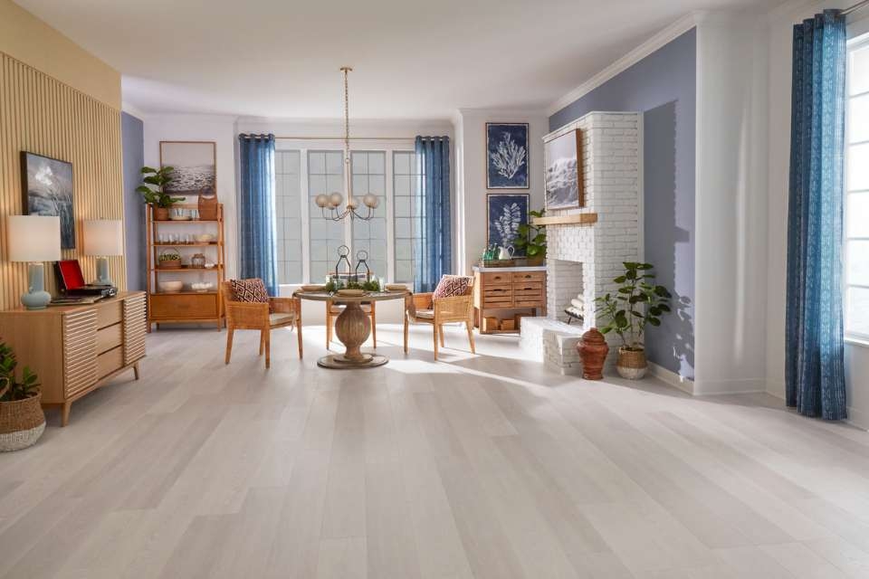 Wood Flooring: Light Wide Plank Flooring & White Brick