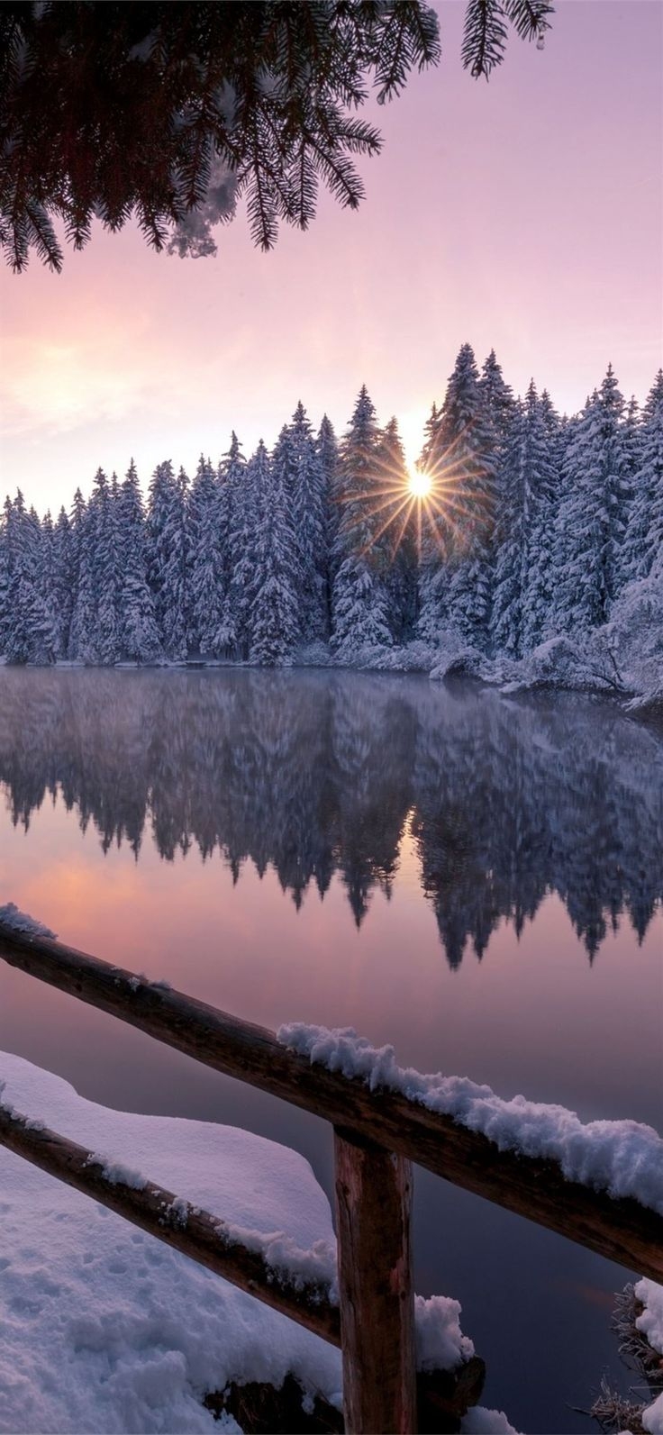 Wooden Railing Sunburst Effect Snowy Alpine Vista Landscape
