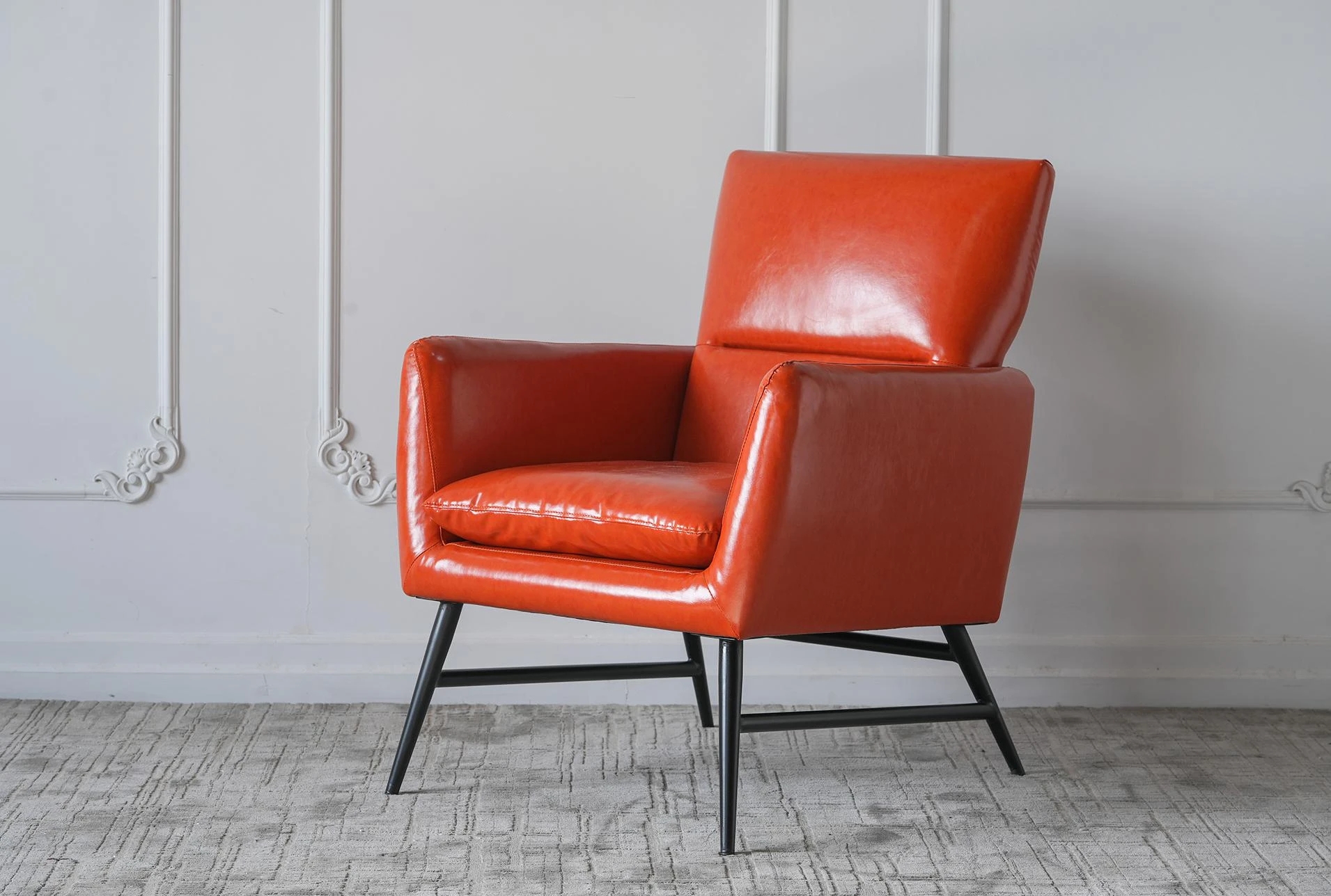 Accent Chair with Cross Stretchers and Bold Orange Tone
