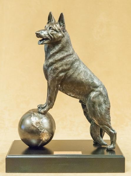 Animal Sculpture with Paws on Globe for Collectible Canine Art