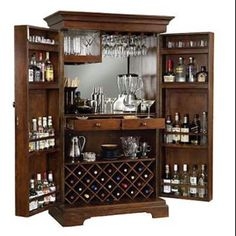 Bar Cabinet featuring Swing Out Doors and Wood Mirror