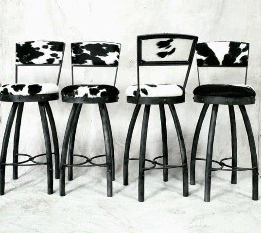 Bar Stool featuring Cowhide Upholstery and Iron Frame