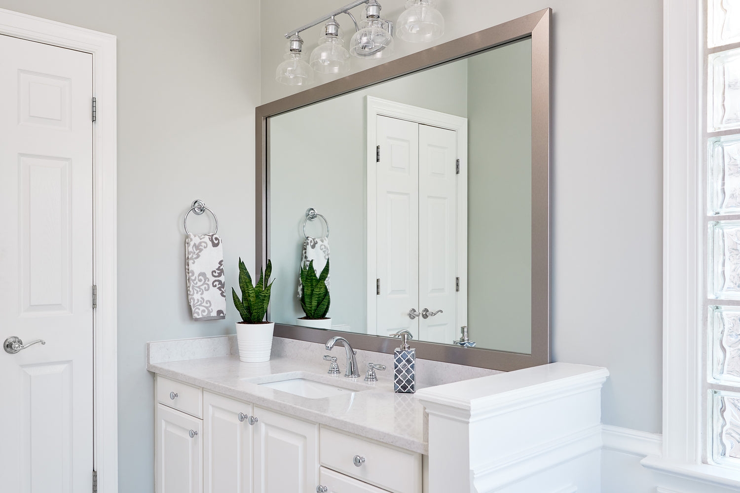 Bathroom Mirror with Wide Metallic Frame and Custom Mirror Framing