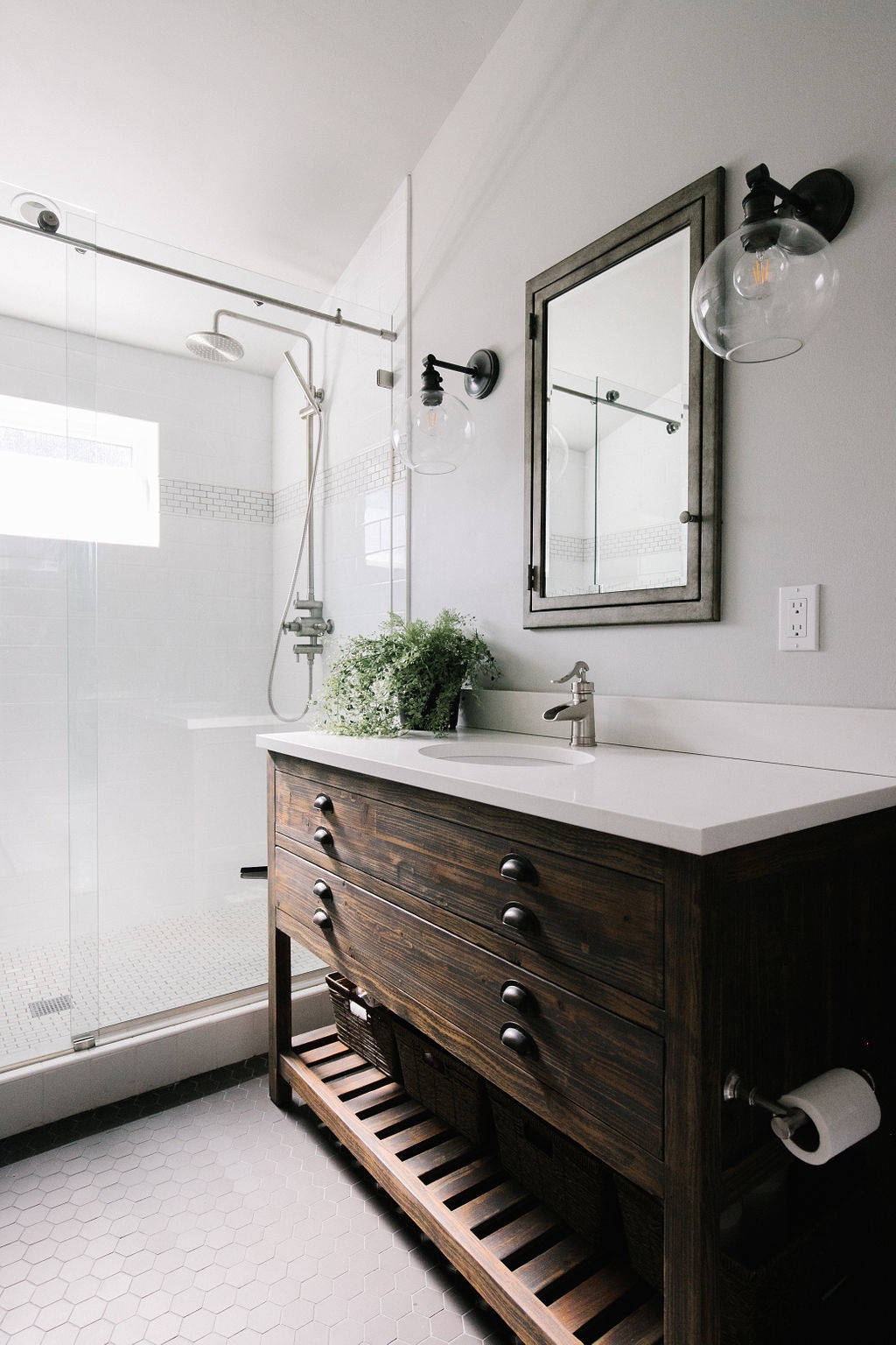 Bathroom Vanity featuring Distressed Wood and Slats